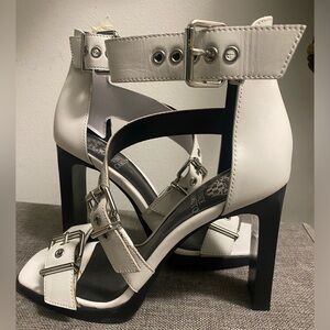 Never worn. 2 pairs. Black and White. 7M